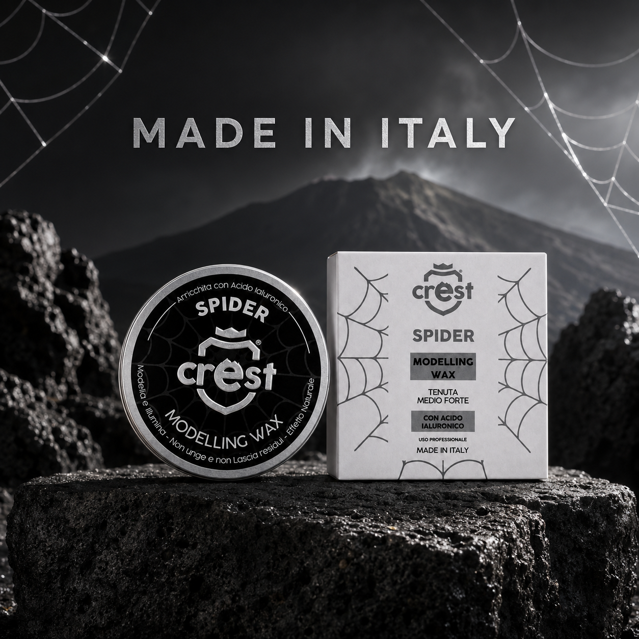 CREST Spider Wax Made in Italy con lattina e scatola ambientate su pietra lavica siciliana.